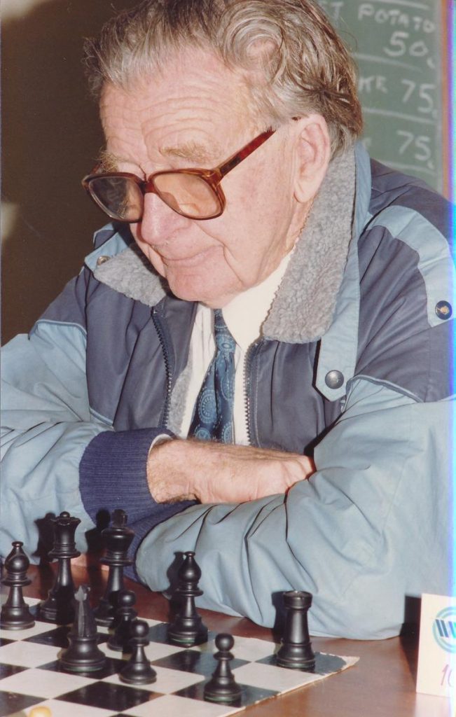 Merv Morrison playing chess in 1987